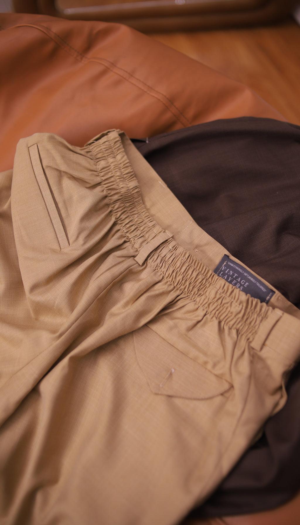 BEIGE Textured Pleated Trousers